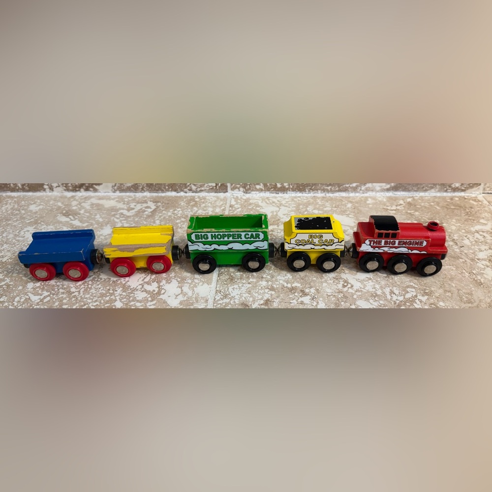 5 wooden train cars (including engine) compatible with Brio and Thomas.